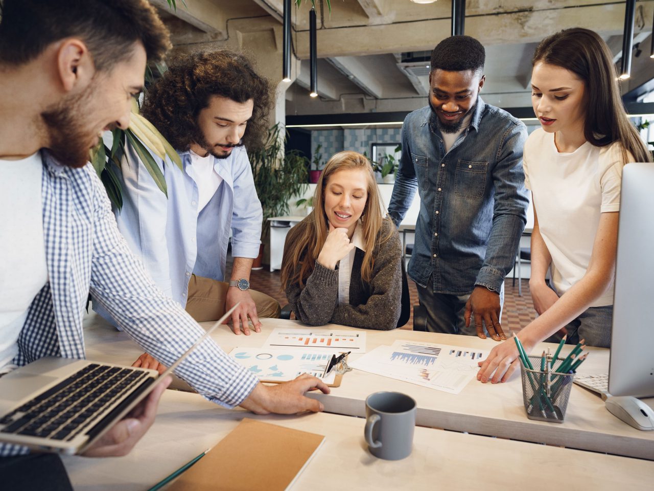 gls-team-diverse-coworkers-modern-office-discuss-their-project-together